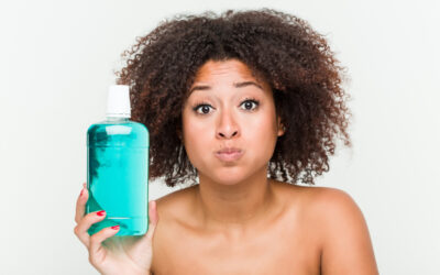 Cum poate o apa de gura sa previna cariile dentare?